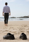 walking barefoot at the beach